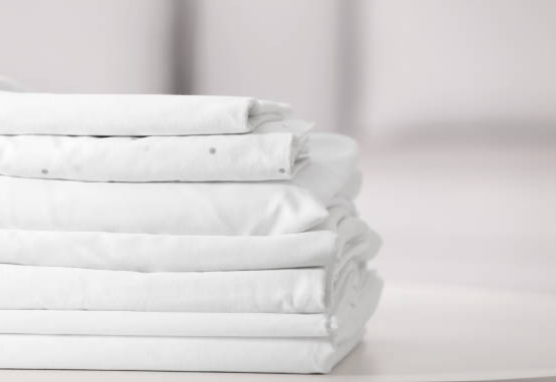 sábanas dobladas, doblar ropa de casa